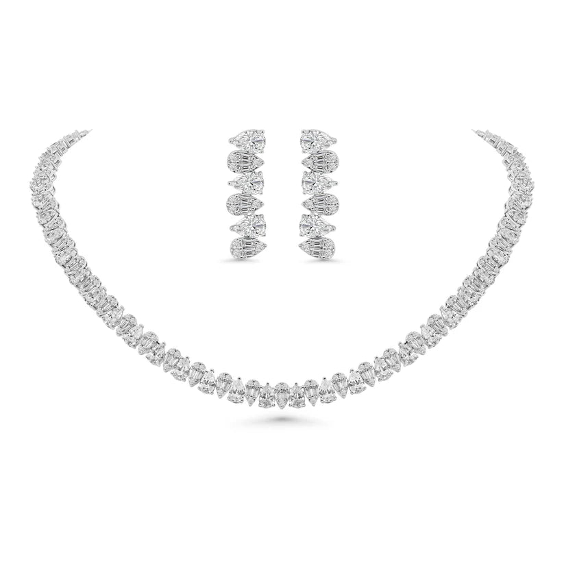 Radiant Pear-Cut Halo Suite for a touch of timeless elegance.