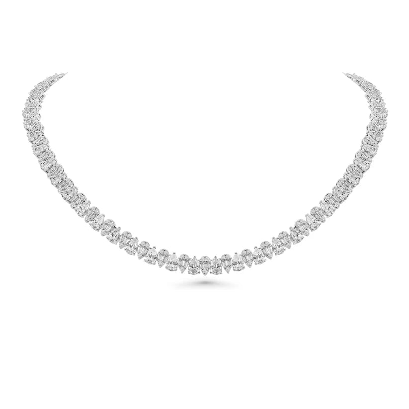 Radiant Pear-Cut Halo Suite for a touch of timeless elegance.